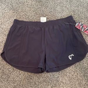 Athletic DNA tennis shorts. NWT. Size L.